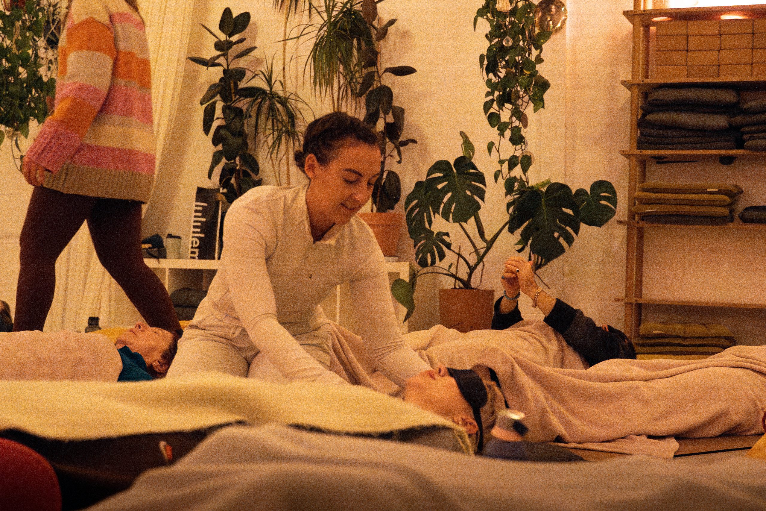 Joely facilitating at a breath-work session at a Mindful Elements team day experience.