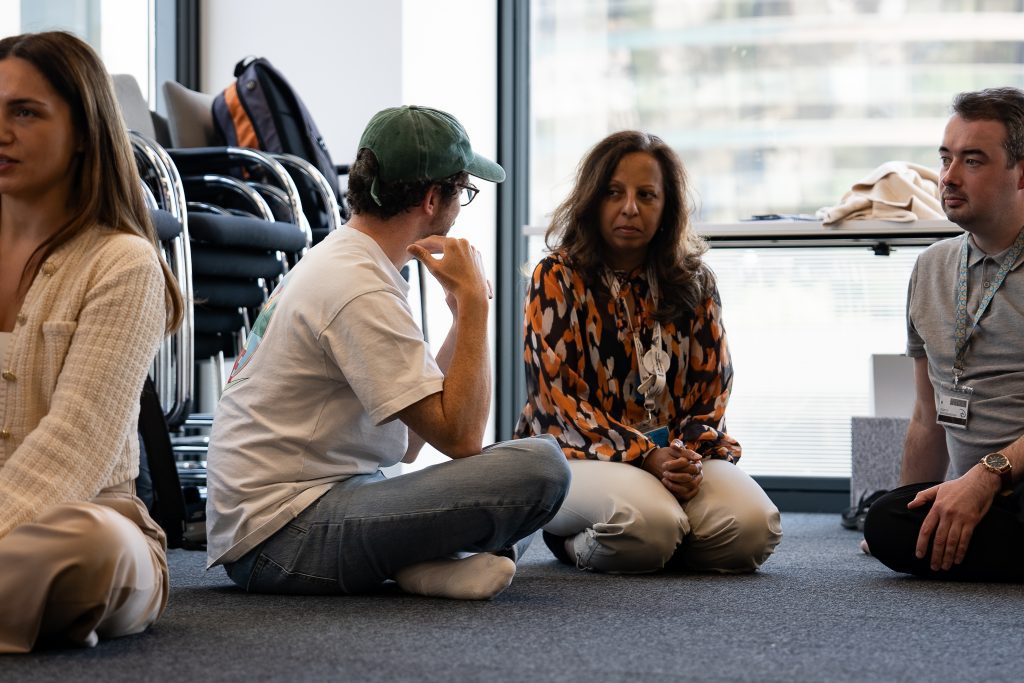 group sharing practice at employee wellbeing session